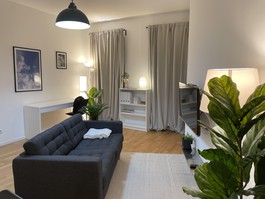 Wohnzimmer mit Küche