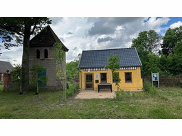 Das Haus und der Glockenturm.