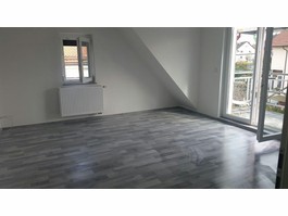 Wohnzimmer mit Balkon